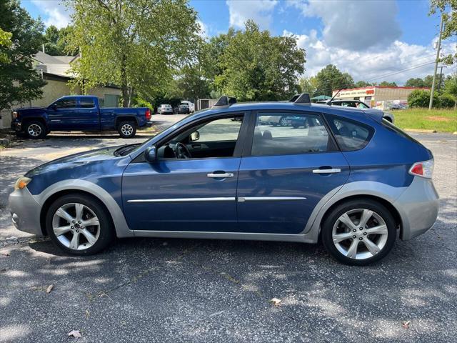 used 2011 Subaru Impreza Outback Sport car, priced at $5,999