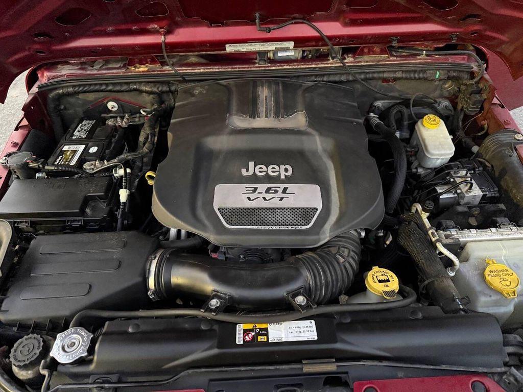 used 2012 Jeep Wrangler Unlimited car, priced at $10,998