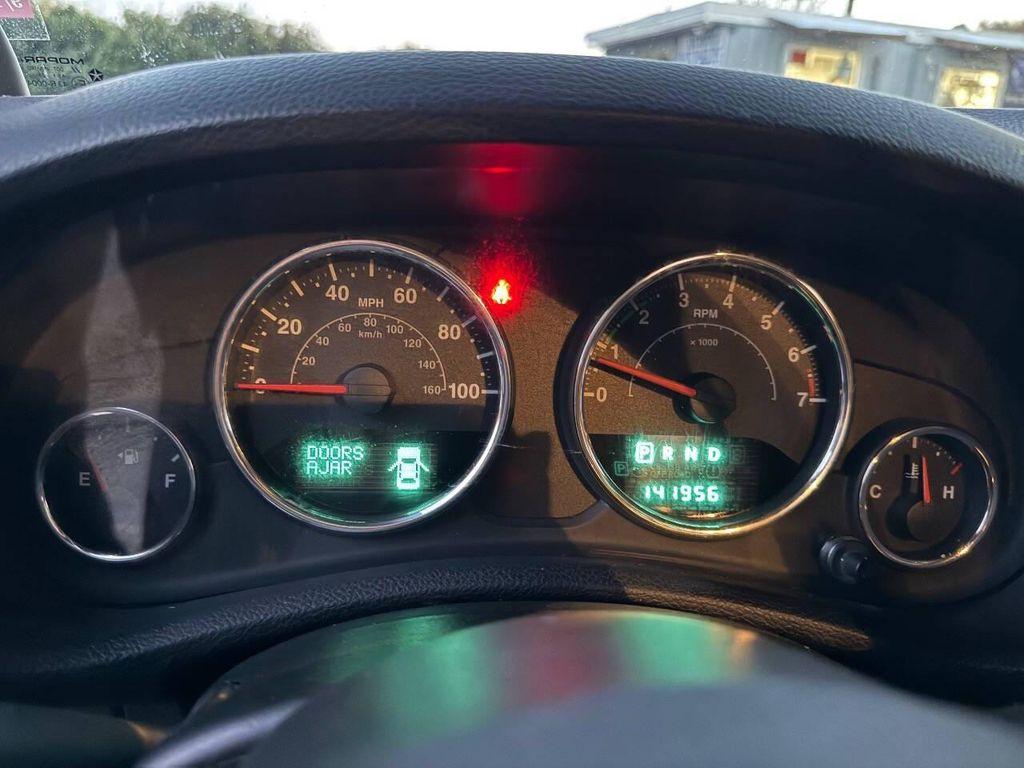 used 2012 Jeep Wrangler Unlimited car, priced at $10,998