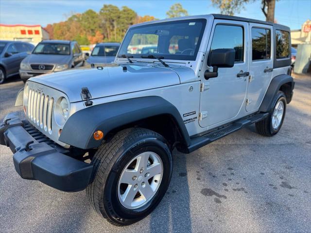 used 2011 Jeep Wrangler Unlimited car, priced at $11,998