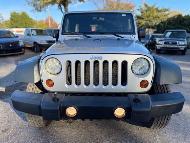 used 2011 Jeep Wrangler Unlimited car, priced at $11,998