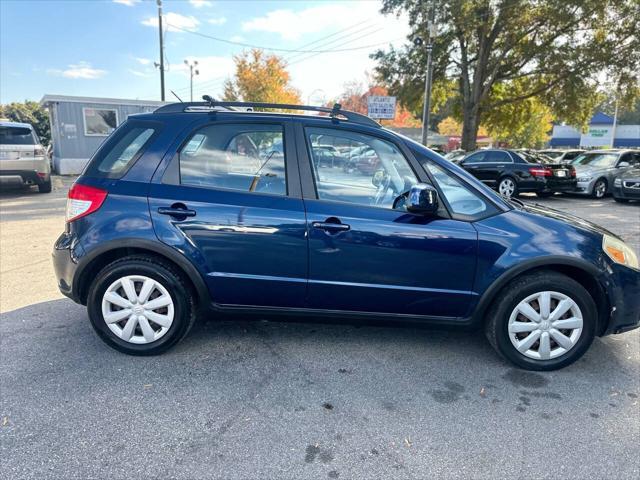 used 2010 Suzuki SX4 car, priced at $3,999