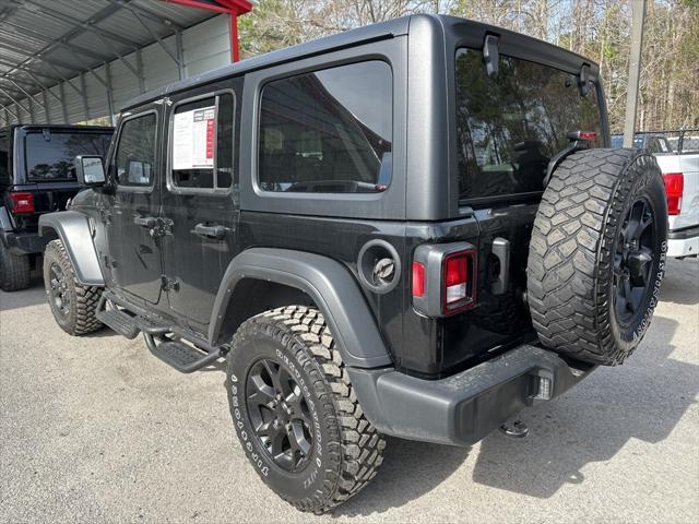 used 2023 Jeep Wrangler car, priced at $28,890