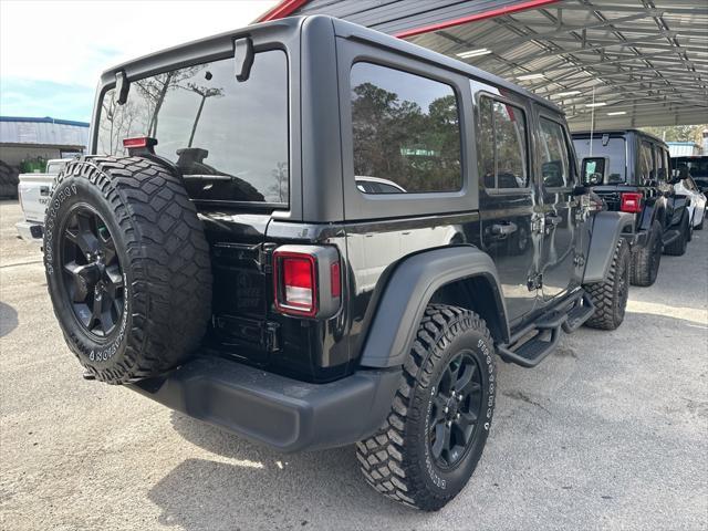 used 2023 Jeep Wrangler car, priced at $28,890