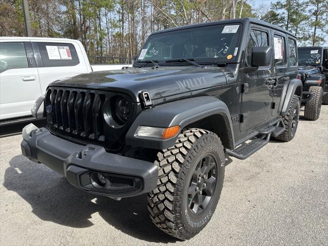 used 2023 Jeep Wrangler car, priced at $28,890