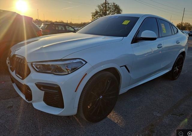 used 2022 BMW X6 car, priced at $57,124