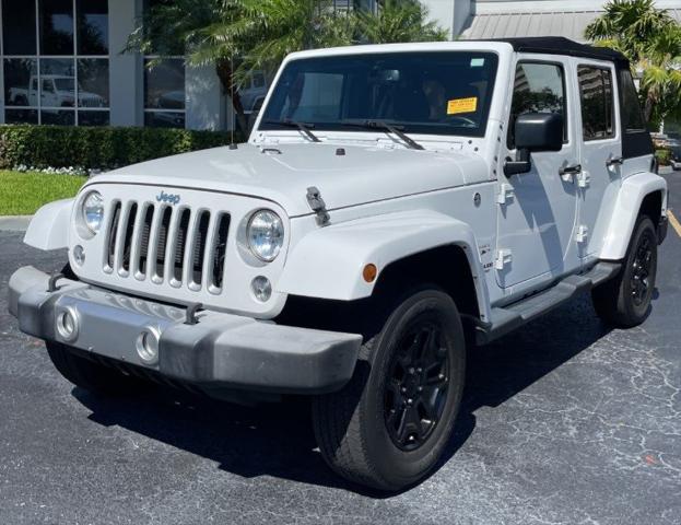 used 2016 Jeep Wrangler Unlimited car, priced at $23,545