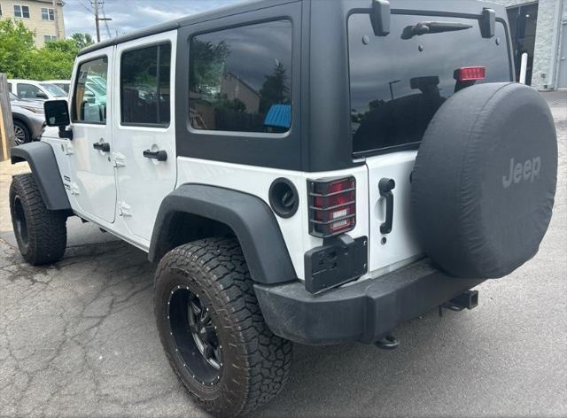used 2014 Jeep Wrangler Unlimited car, priced at $20,999