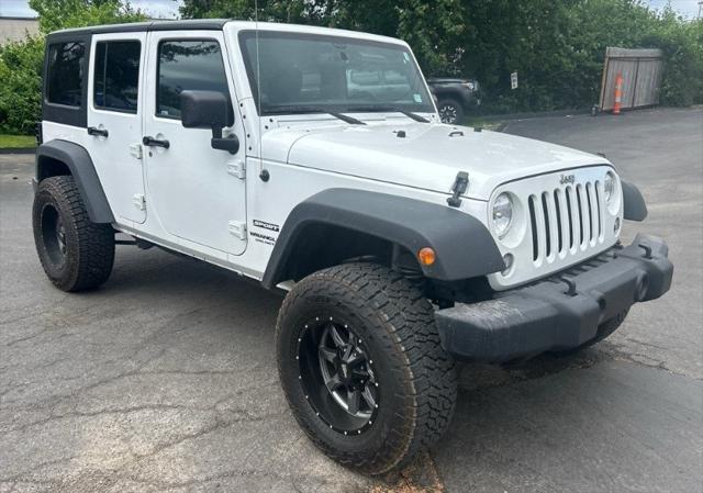 used 2014 Jeep Wrangler Unlimited car, priced at $20,999