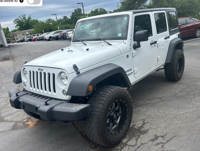 used 2014 Jeep Wrangler Unlimited car, priced at $20,999