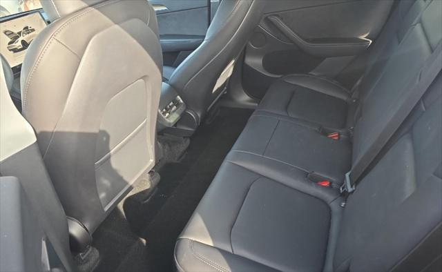 used 2023 Tesla Model Y car, priced at $34,990