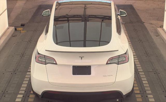 used 2023 Tesla Model Y car, priced at $34,990