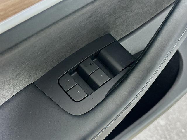 used 2023 Tesla Model Y car, priced at $34,990