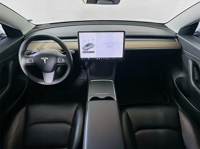 used 2021 Tesla Model 3 car, priced at $20,000