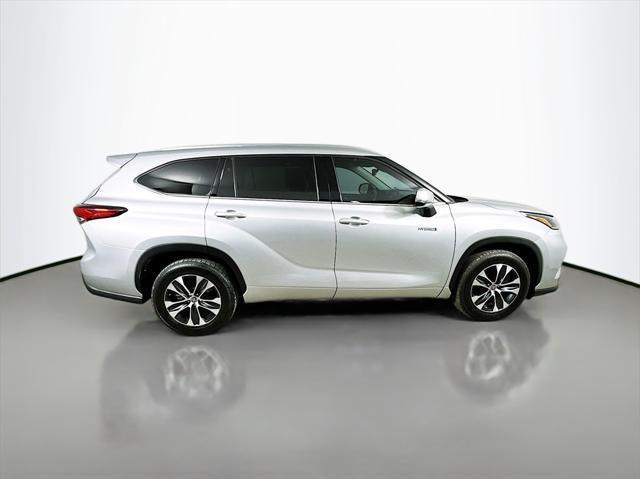 used 2021 Toyota Highlander Hybrid car, priced at $29,957