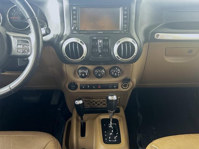 used 2015 Jeep Wrangler Unlimited car, priced at $17,553