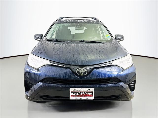 used 2018 Toyota RAV4 car, priced at $17,999