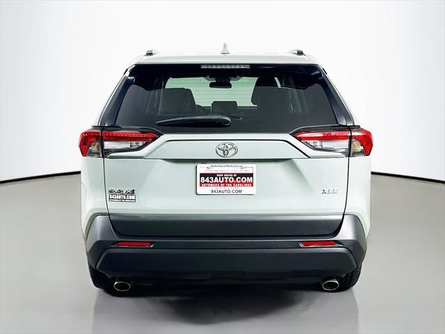 used 2023 Toyota RAV4 car, priced at $30,742