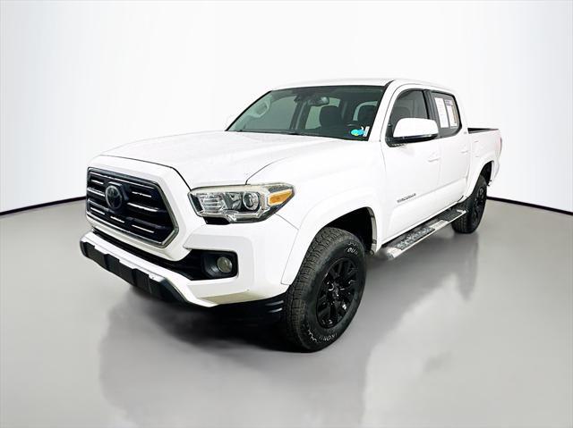 used 2018 Toyota Tacoma car, priced at $22,700