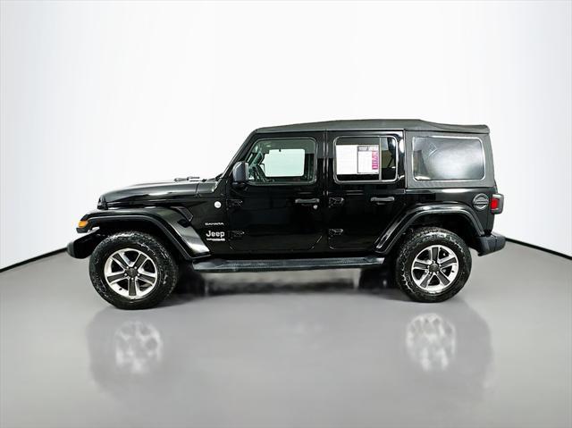 used 2021 Jeep Wrangler Unlimited car, priced at $31,587