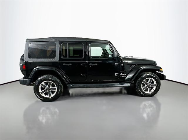 used 2021 Jeep Wrangler Unlimited car, priced at $31,587