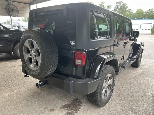 used 2016 Jeep Wrangler Unlimited car, priced at $18,772