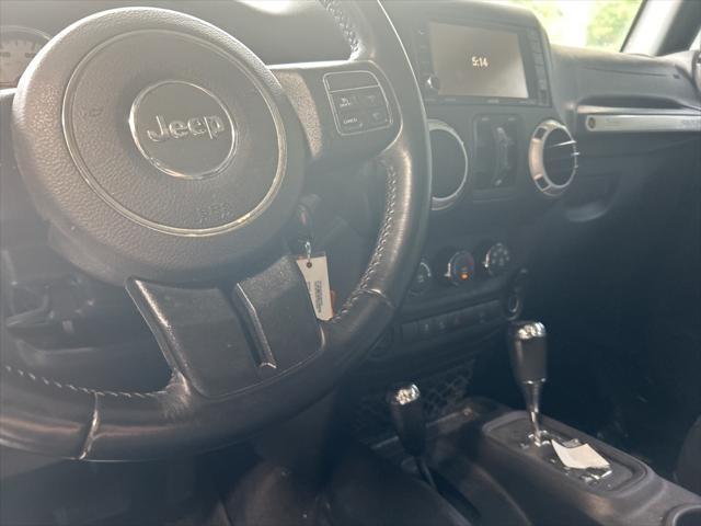 used 2016 Jeep Wrangler Unlimited car, priced at $18,772