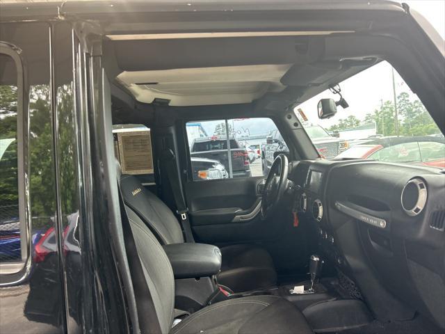 used 2016 Jeep Wrangler Unlimited car, priced at $18,772