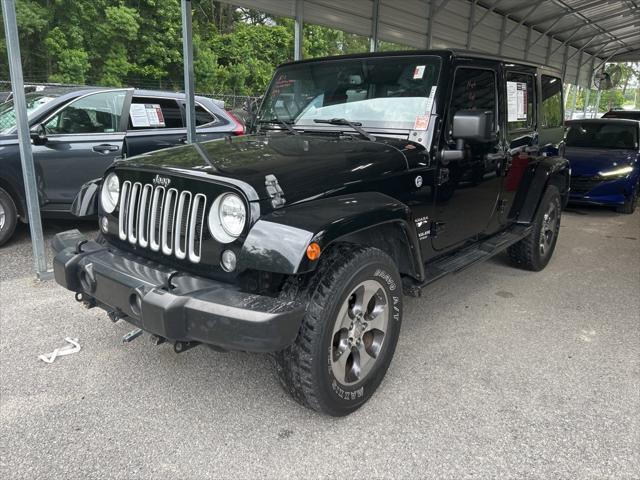 used 2016 Jeep Wrangler Unlimited car, priced at $18,772