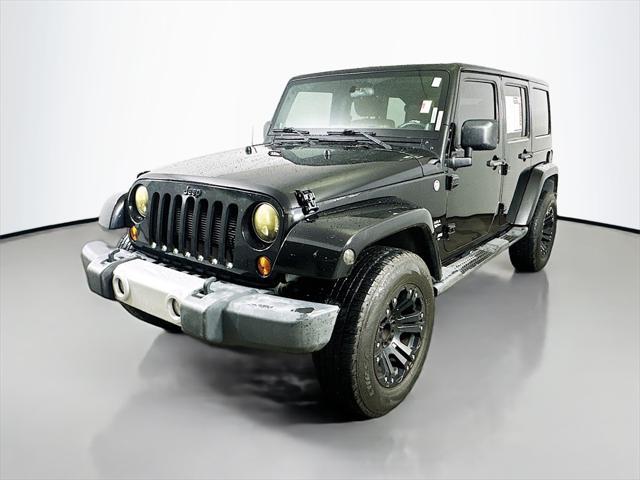 used 2012 Jeep Wrangler Unlimited car, priced at $16,597