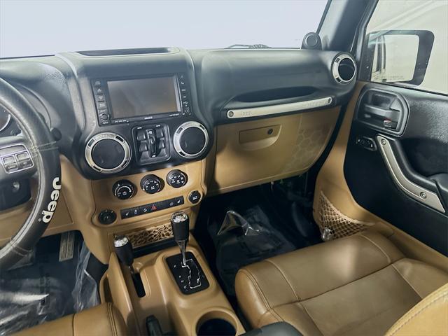 used 2012 Jeep Wrangler Unlimited car, priced at $16,597