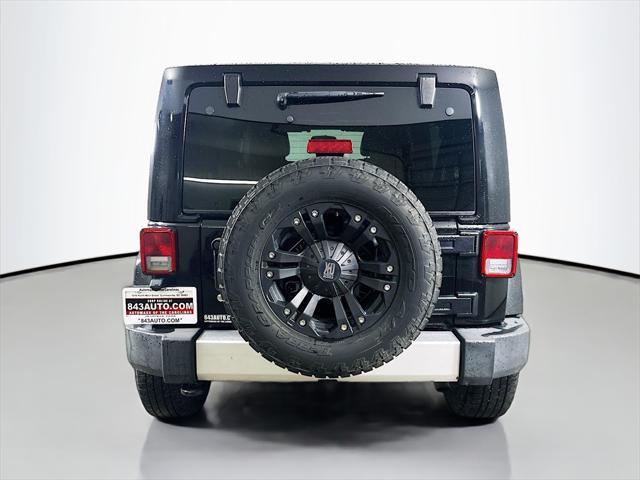 used 2012 Jeep Wrangler Unlimited car, priced at $16,597