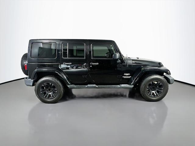 used 2012 Jeep Wrangler Unlimited car, priced at $16,597