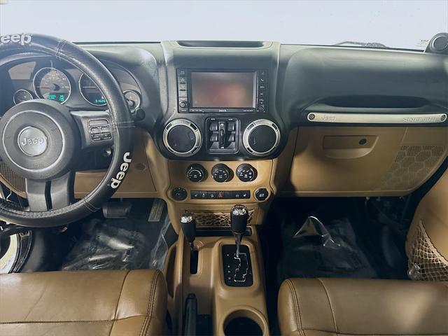 used 2012 Jeep Wrangler Unlimited car, priced at $16,597