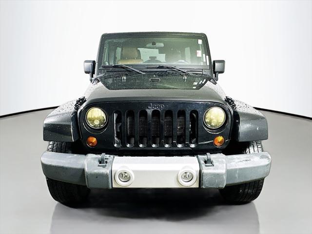 used 2012 Jeep Wrangler Unlimited car, priced at $16,597