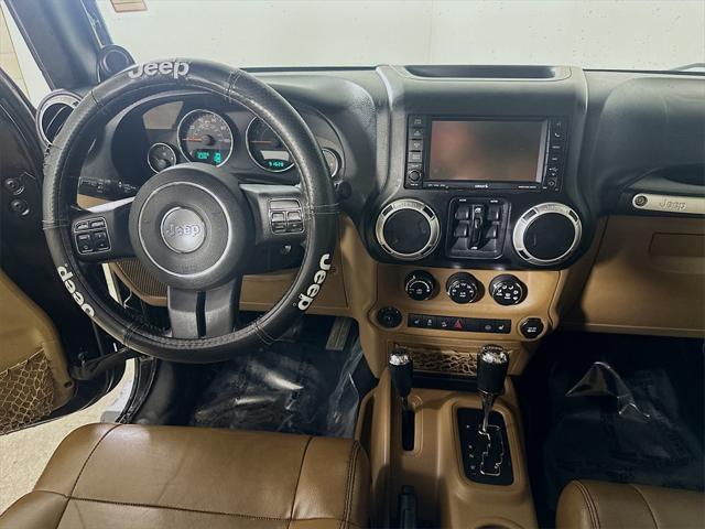 used 2012 Jeep Wrangler Unlimited car, priced at $16,597