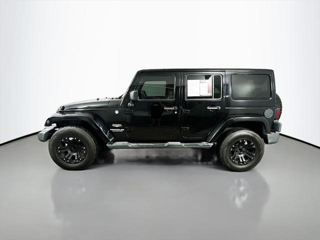used 2012 Jeep Wrangler Unlimited car, priced at $16,597