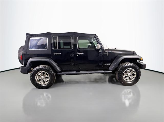 used 2014 Jeep Wrangler Unlimited car, priced at $18,700