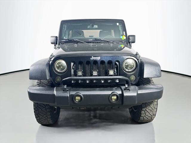 used 2014 Jeep Wrangler Unlimited car, priced at $18,700