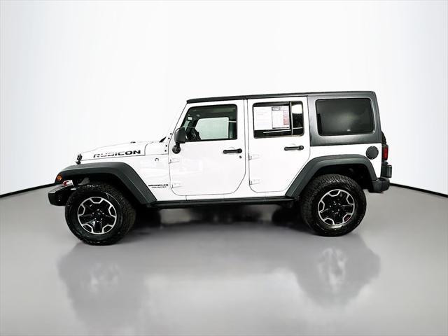 used 2014 Jeep Wrangler Unlimited car, priced at $16,999