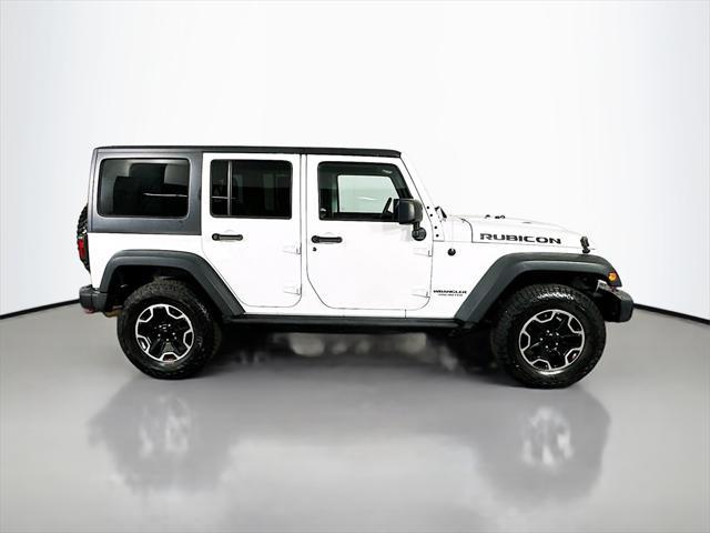 used 2014 Jeep Wrangler Unlimited car, priced at $16,999