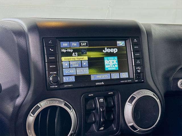 used 2014 Jeep Wrangler Unlimited car, priced at $16,999