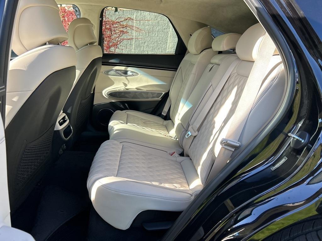 used 2025 Genesis GV70 car, priced at $60,995