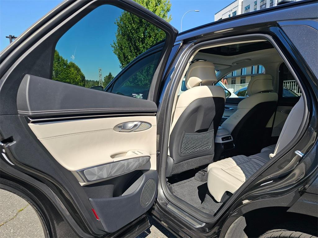 used 2025 Genesis GV70 car, priced at $60,868
