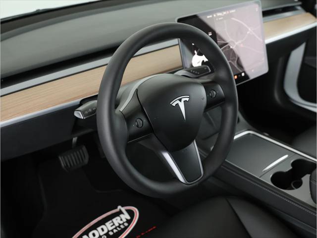 used 2023 Tesla Model 3 car, priced at $28,480