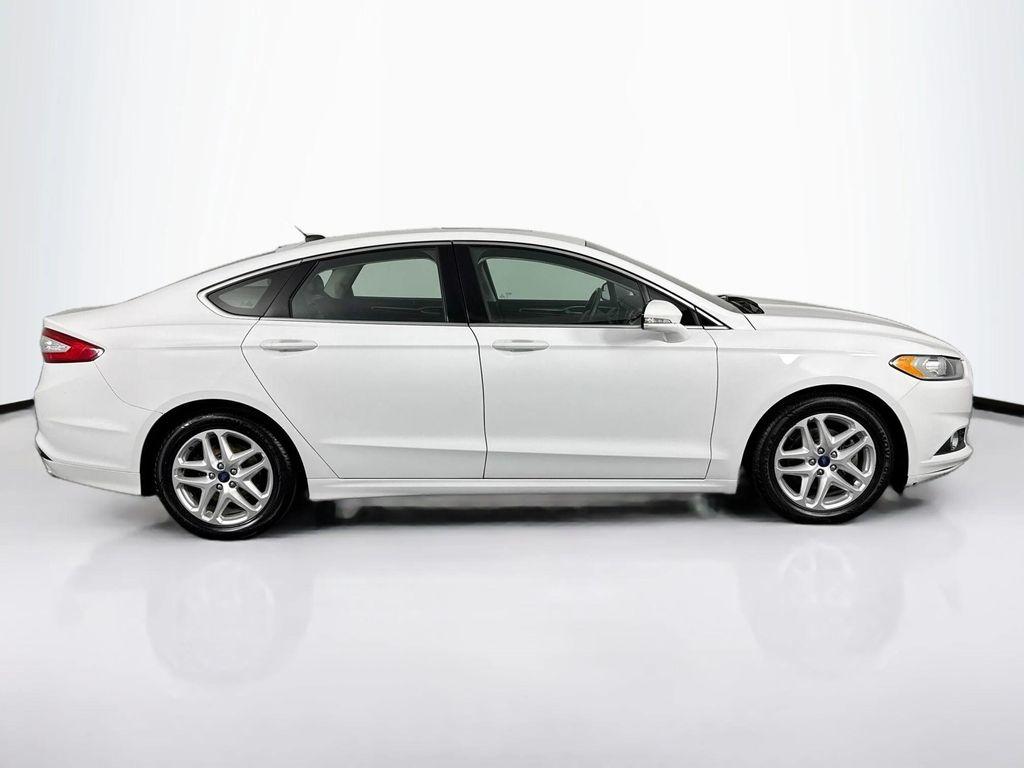 used 2016 Ford Fusion car, priced at $12,450