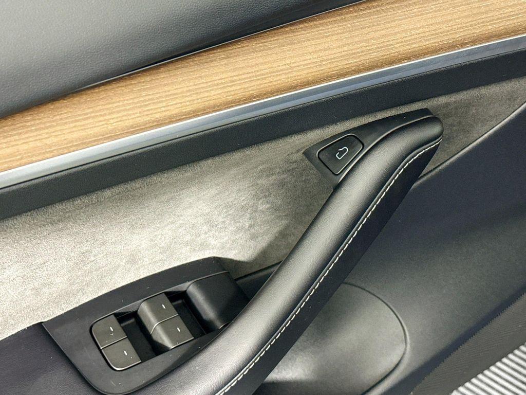 used 2023 Tesla Model 3 car, priced at $30,980