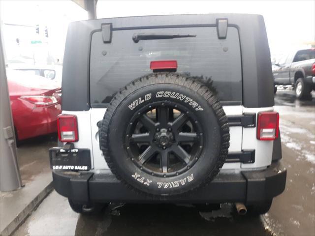 used 2010 Jeep Wrangler Unlimited car, priced at $9,995