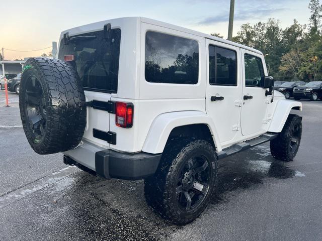 used 2015 Jeep Wrangler Unlimited car, priced at $15,872