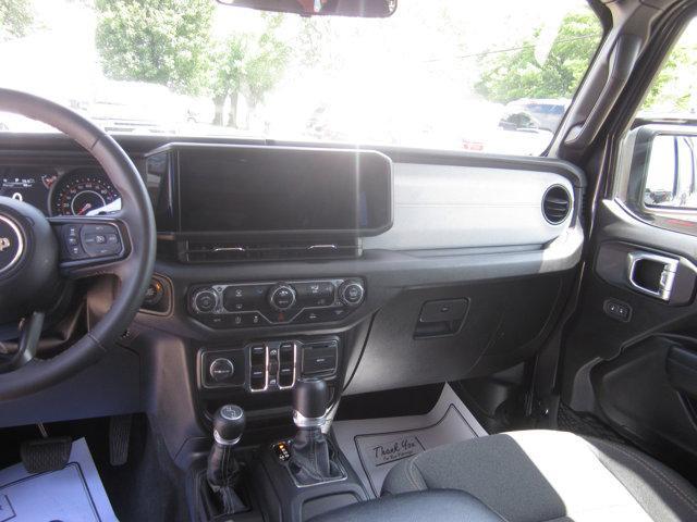 used 2024 Jeep Wrangler car, priced at $34,172